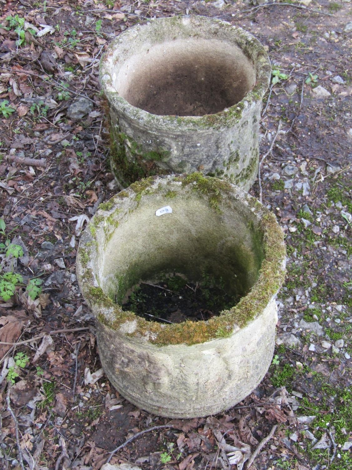 A pair of weathered cast composition stone squat cylindrical planters with repeating classical - Image 2 of 5