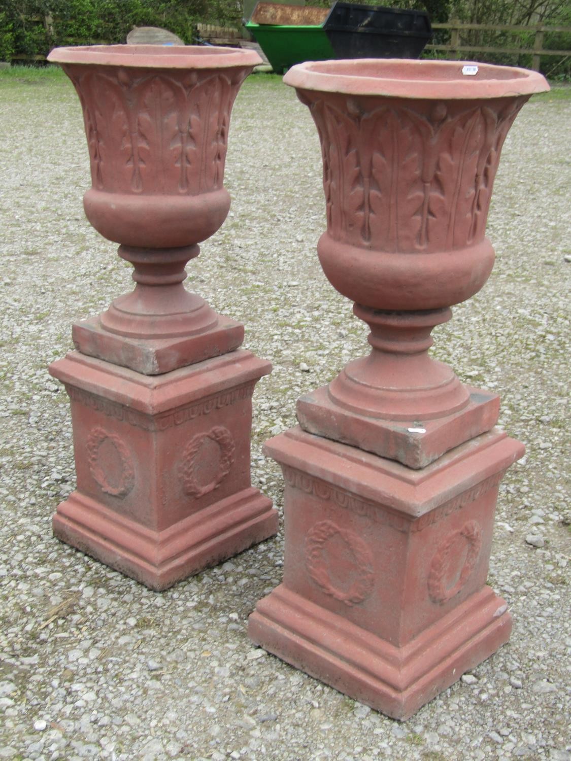 A pair of faux terracotta cast composition stone trumpet shaped garden urns with repeating leaf - Image 2 of 6