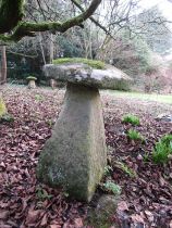 A limestone staddle stone and cap, 80 cm height