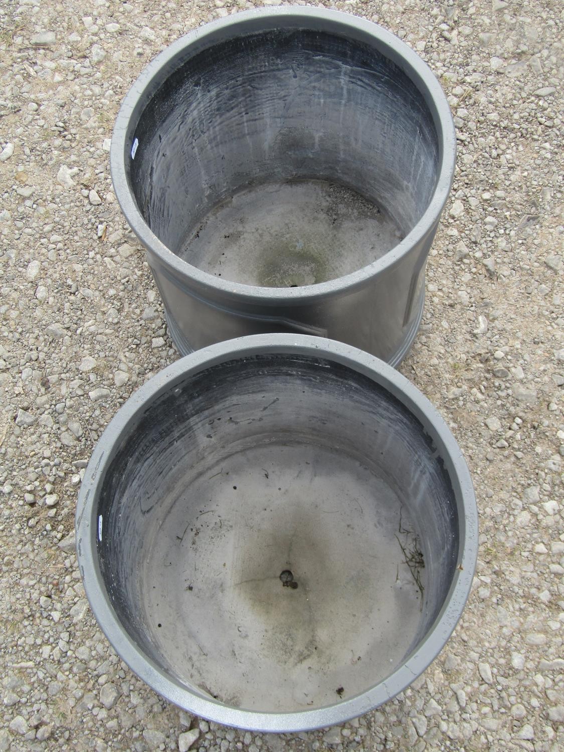 A pair of cylindrical fibre glass simulated lead planters with repeating panels, 38 cm high x 38 - Image 2 of 4