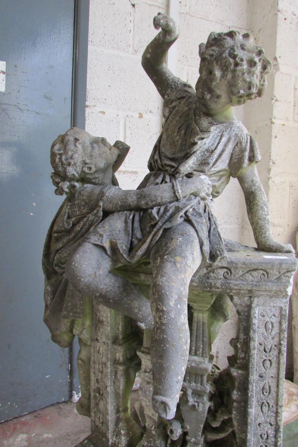 A 19th century weathered marble garden figure group, in the form of jostling infants on a - Image 7 of 7