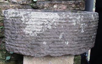 A local stone D end trough with carved detail, 58 cm long x 58 cm wide x 24 cm high