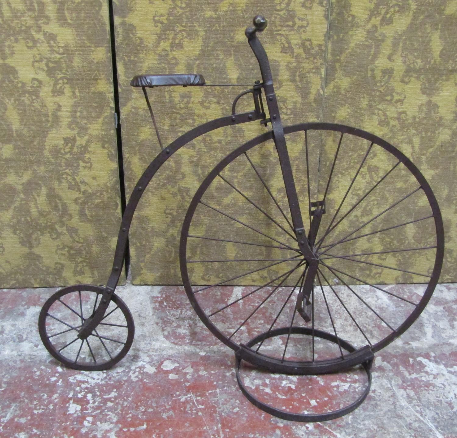 A decorative model penny farthing bicycle, 105cm high