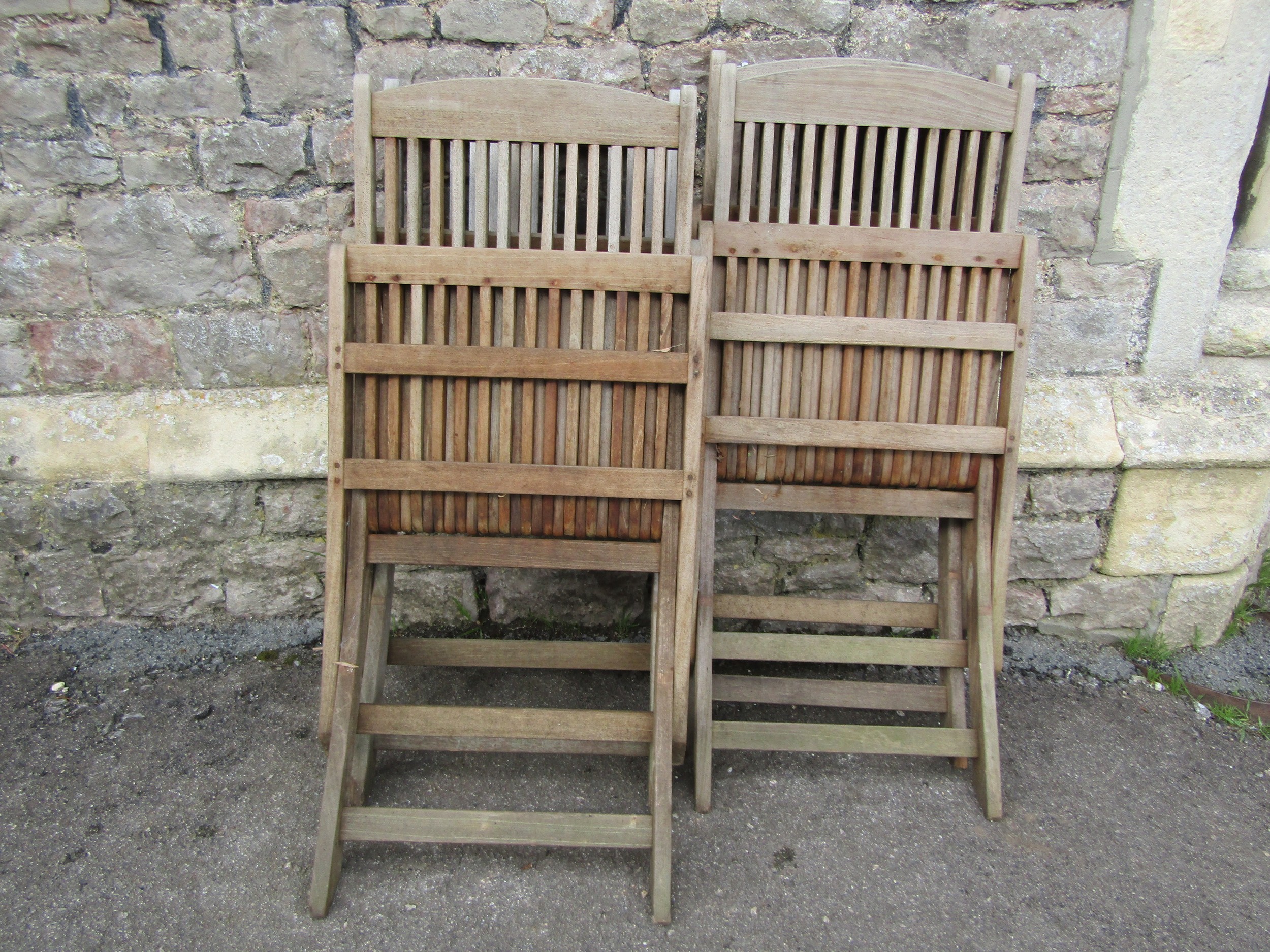 A set of four weathered Windsor Set folding teak garden chairs with slatted seats and backs - Image 3 of 4