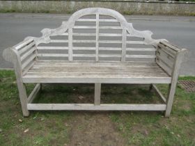 A weathered (silvered) teak Lutyens style three seat garden bench, 166 cm wide