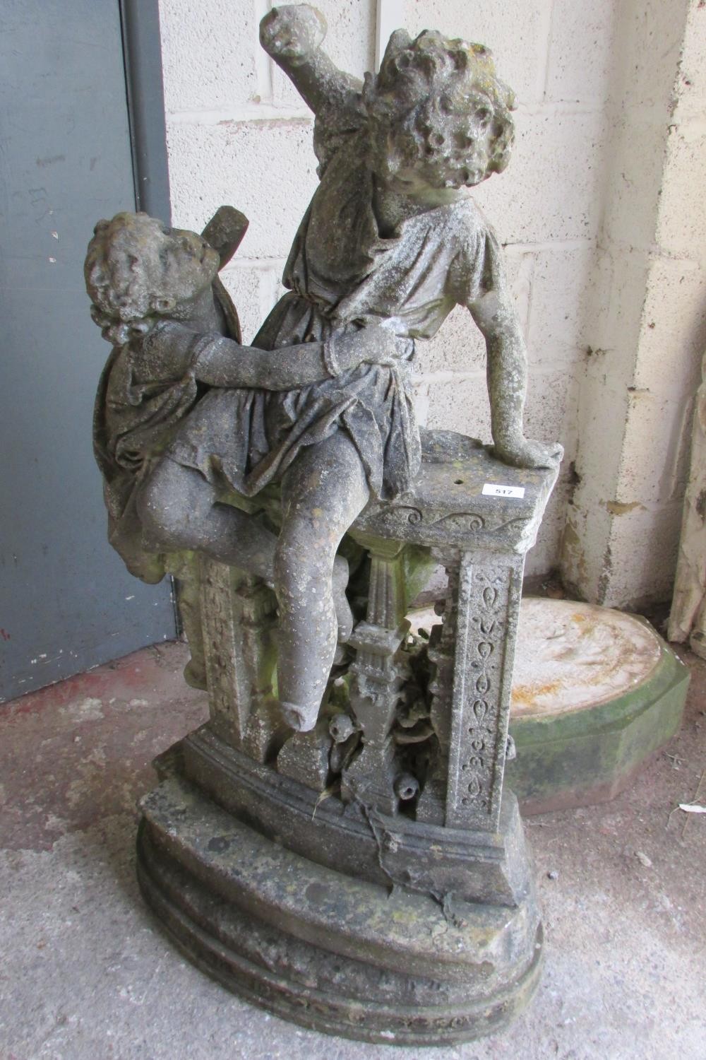 A 19th century weathered marble garden figure group, in the form of jostling infants on a - Image 2 of 7