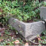 A local stone trough with carved detail, 90 cm x 45 cm x 25 cm high (af)