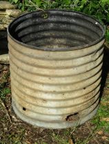 A corrugated galvanised tank, later, use that as a planter or possibly incinerator, 53cm high,