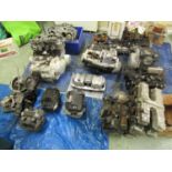 Five motorcycle engine/blocks, together with various cylinder heads etc