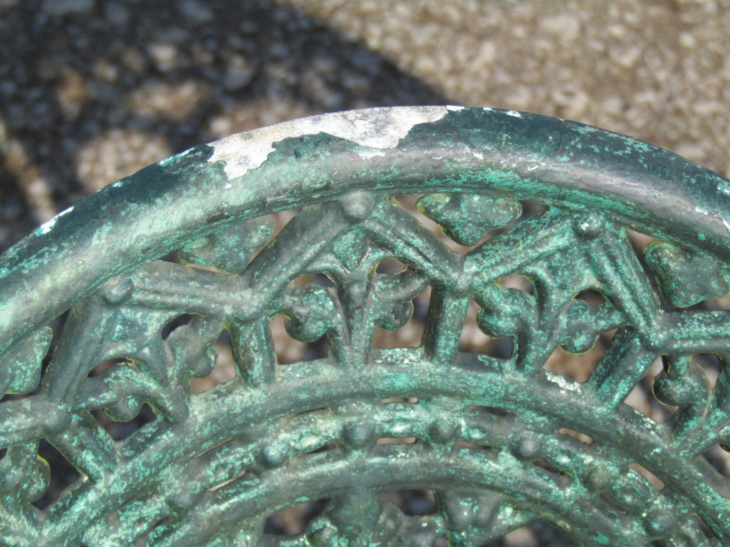 A weathered green painted cast alloy garden bench with shaped outline and decorative pierced - Image 9 of 10