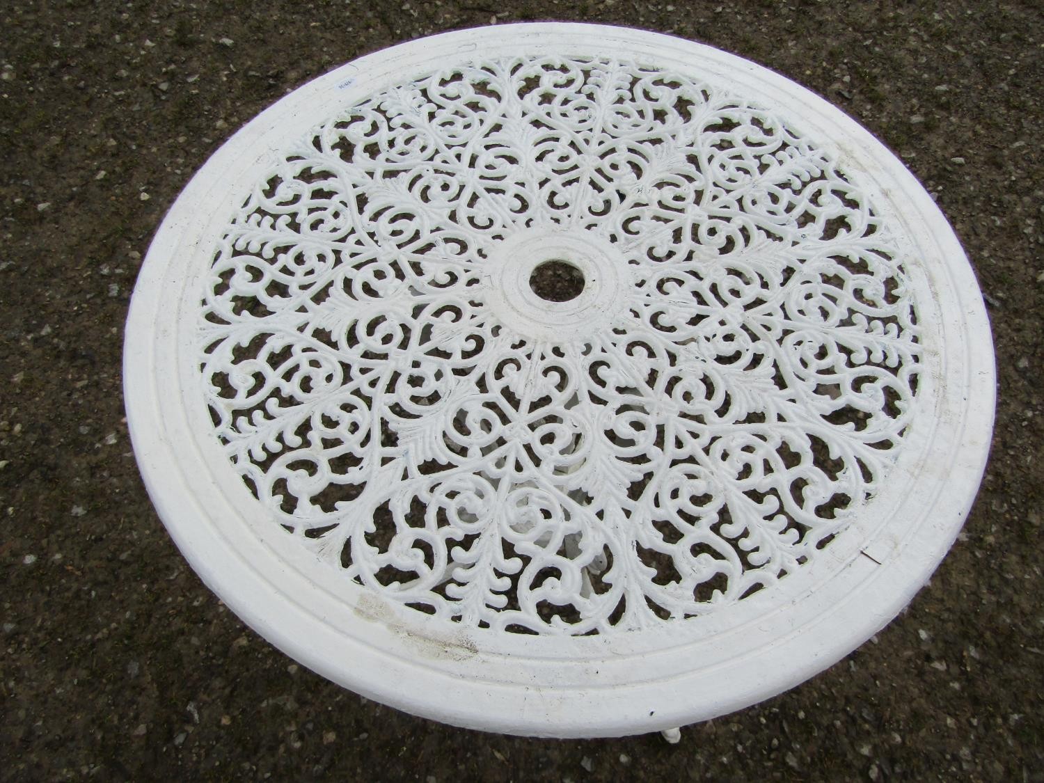 A small cream painted cast alloy garden terrace table with decorative pierced repeating scrolling - Image 4 of 4