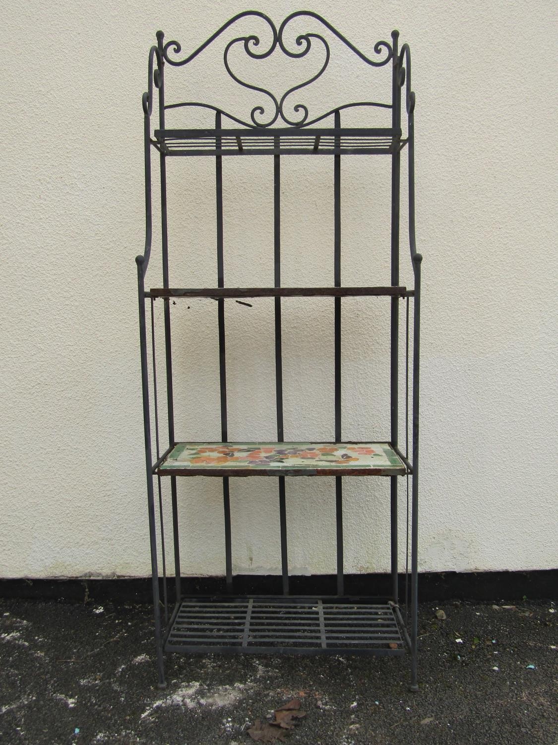 A four tier freestanding open shelving unit with strap work and tiled shelves 162 cm (full height) x