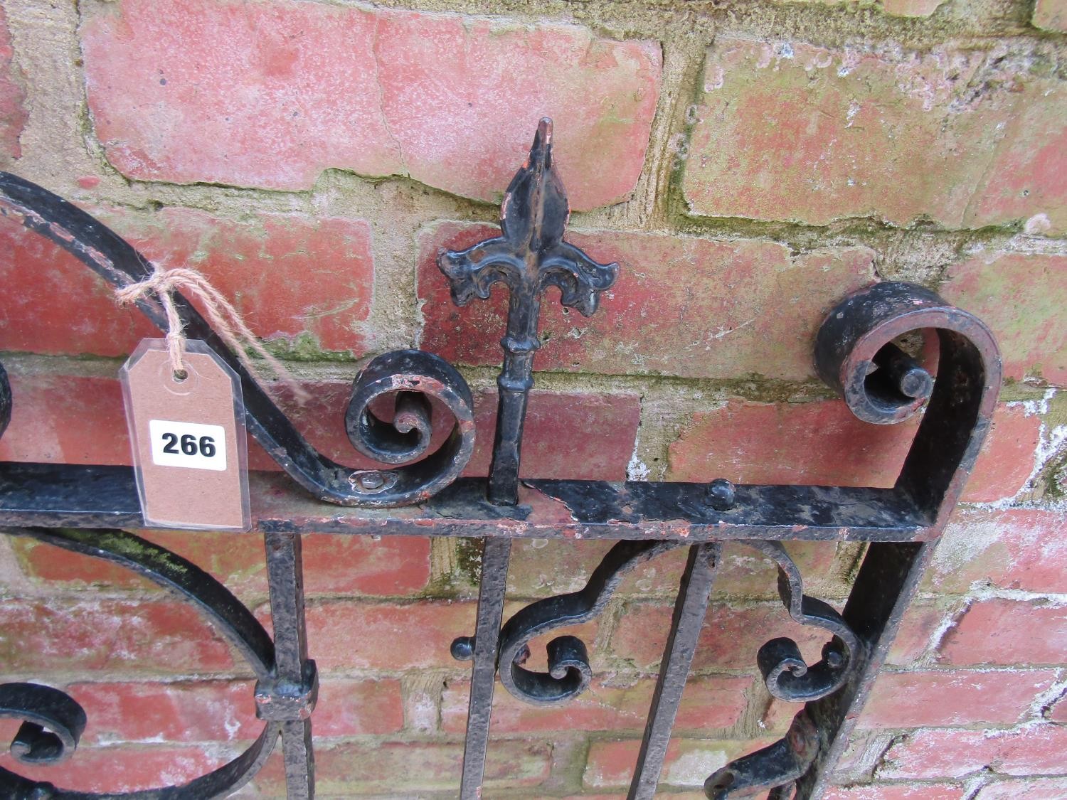 A heavy gauge iron gate with decorative open scroll work detail and spearhead finials, 121cm high - Image 4 of 4