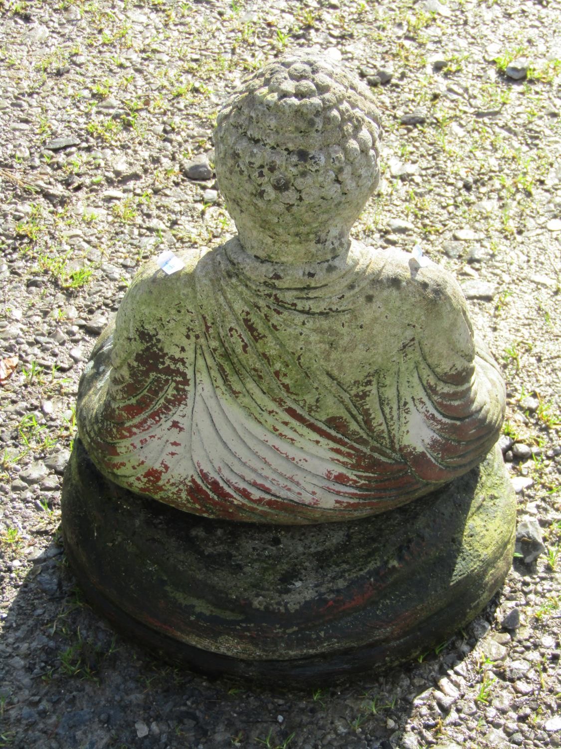 A cast composition stone garden ornament in the form of a seated Buddha in lotus position, raised on - Image 2 of 4