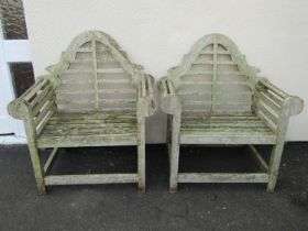 A pair of weathered teak Lutyens style garden chairs with generous seats, 92 cm wide x 104 cm (