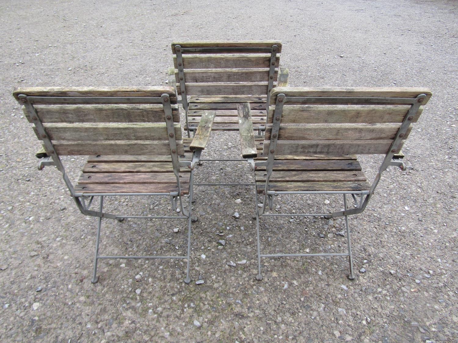 A set of three folding steel framed garden open armchairs with weathered timbered slats, 63 cm - Image 4 of 5