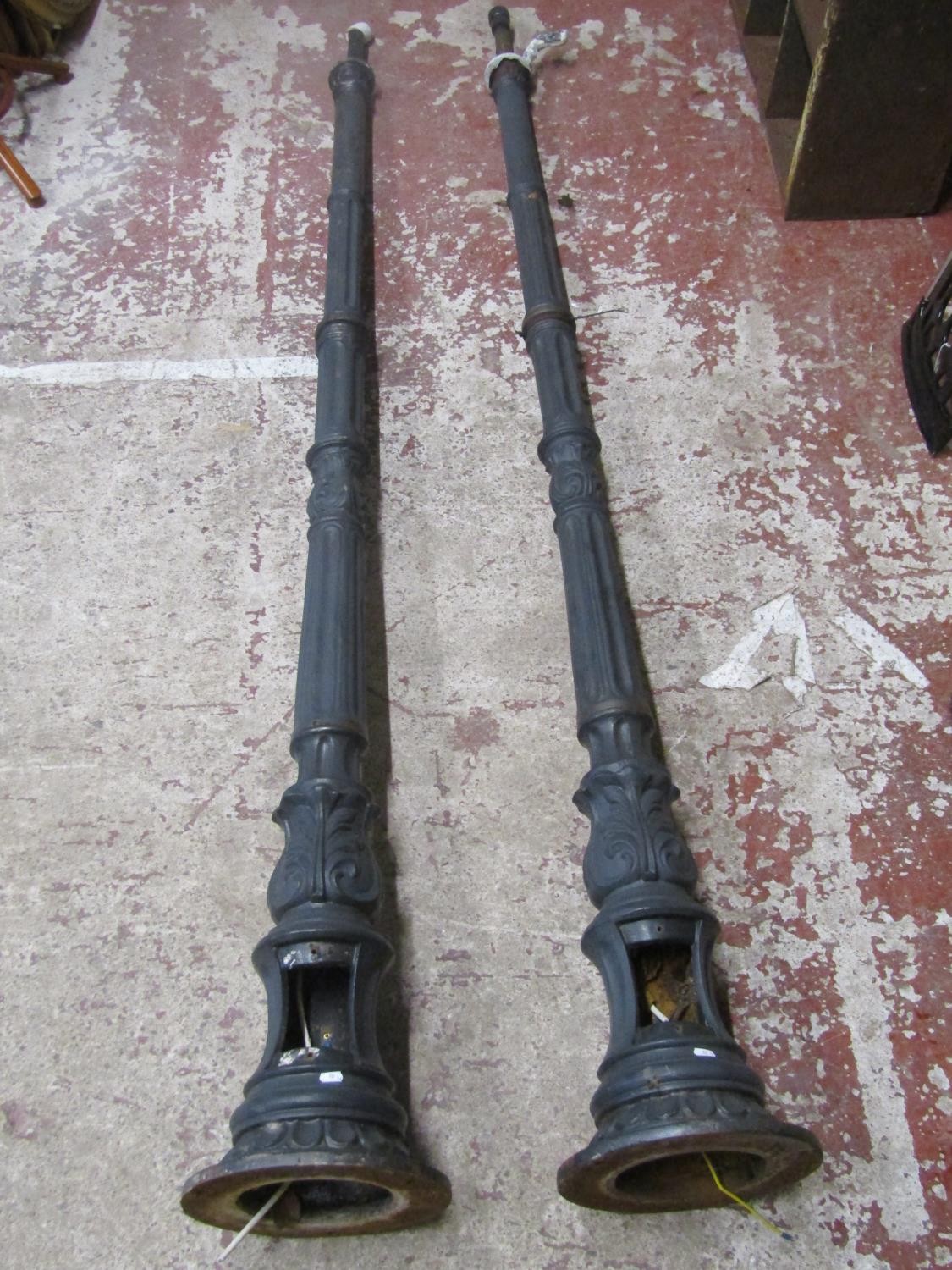A pair of Victorian style cast iron street lamp posts (lacks hoods) Approx 252cm high