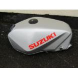 Suzuki fuel tank (appears as new/unused)