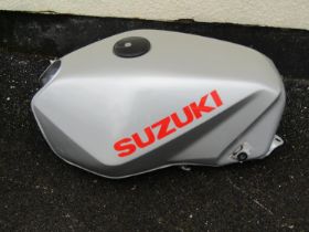 Suzuki fuel tank (appears as new/unused)