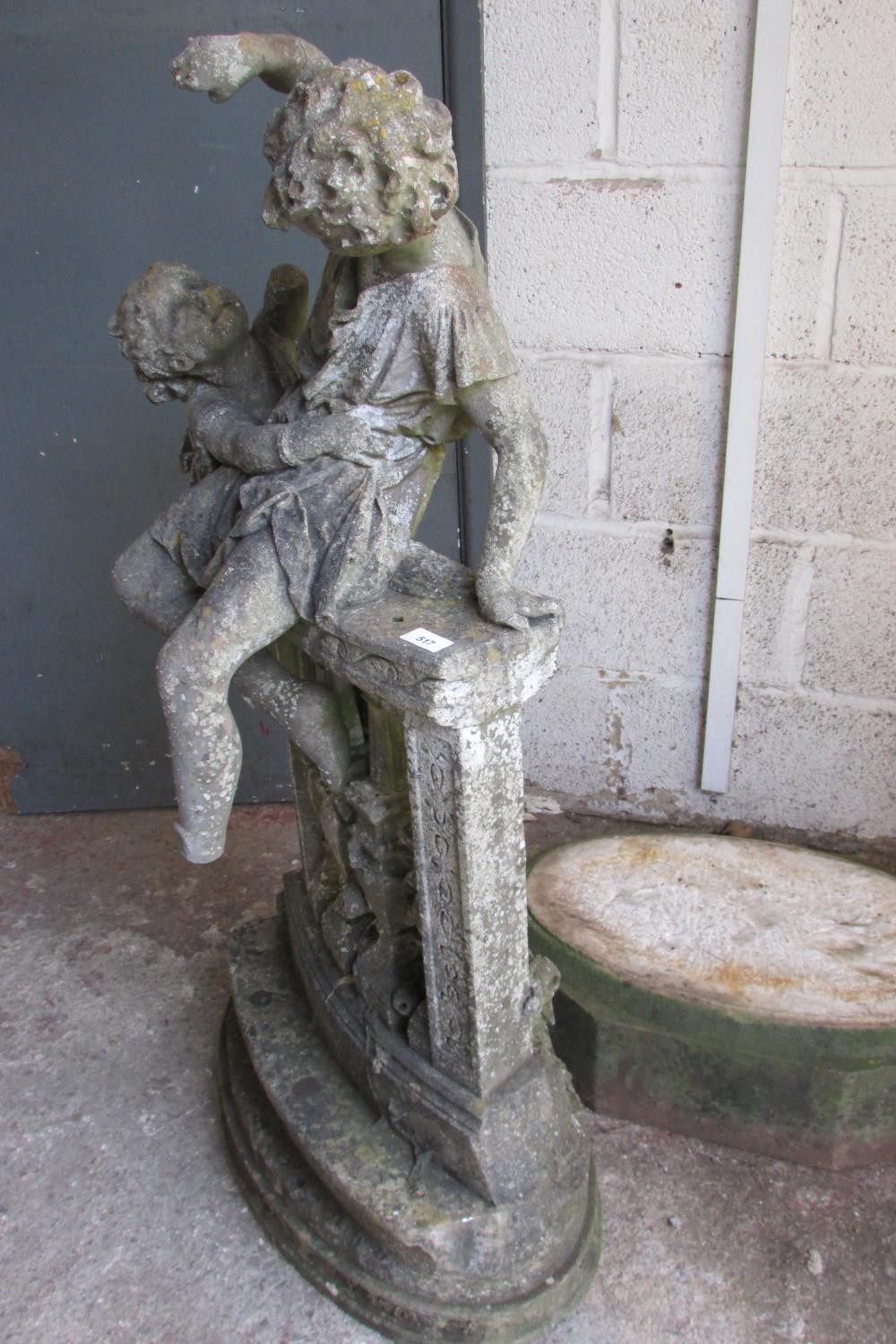 A 19th century weathered marble garden figure group, in the form of jostling infants on a - Image 3 of 7