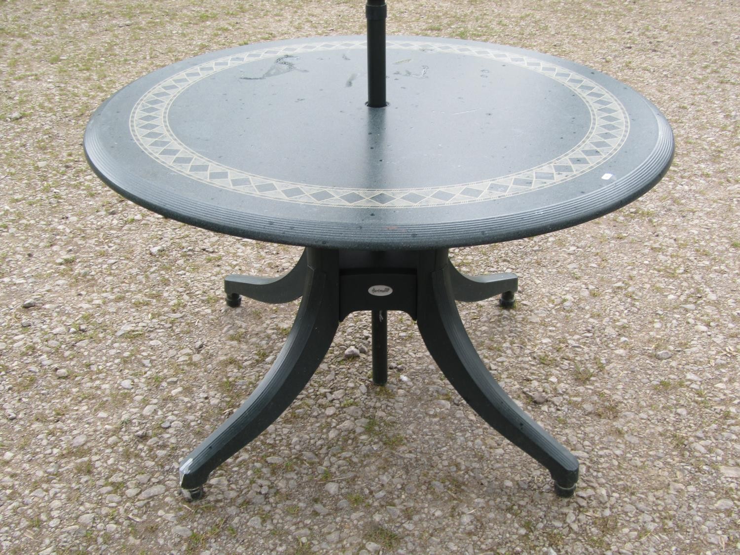 A moulded plastic patio set by Hartman consisting of a circular top table, 120 cm diameter raised on - Image 2 of 7