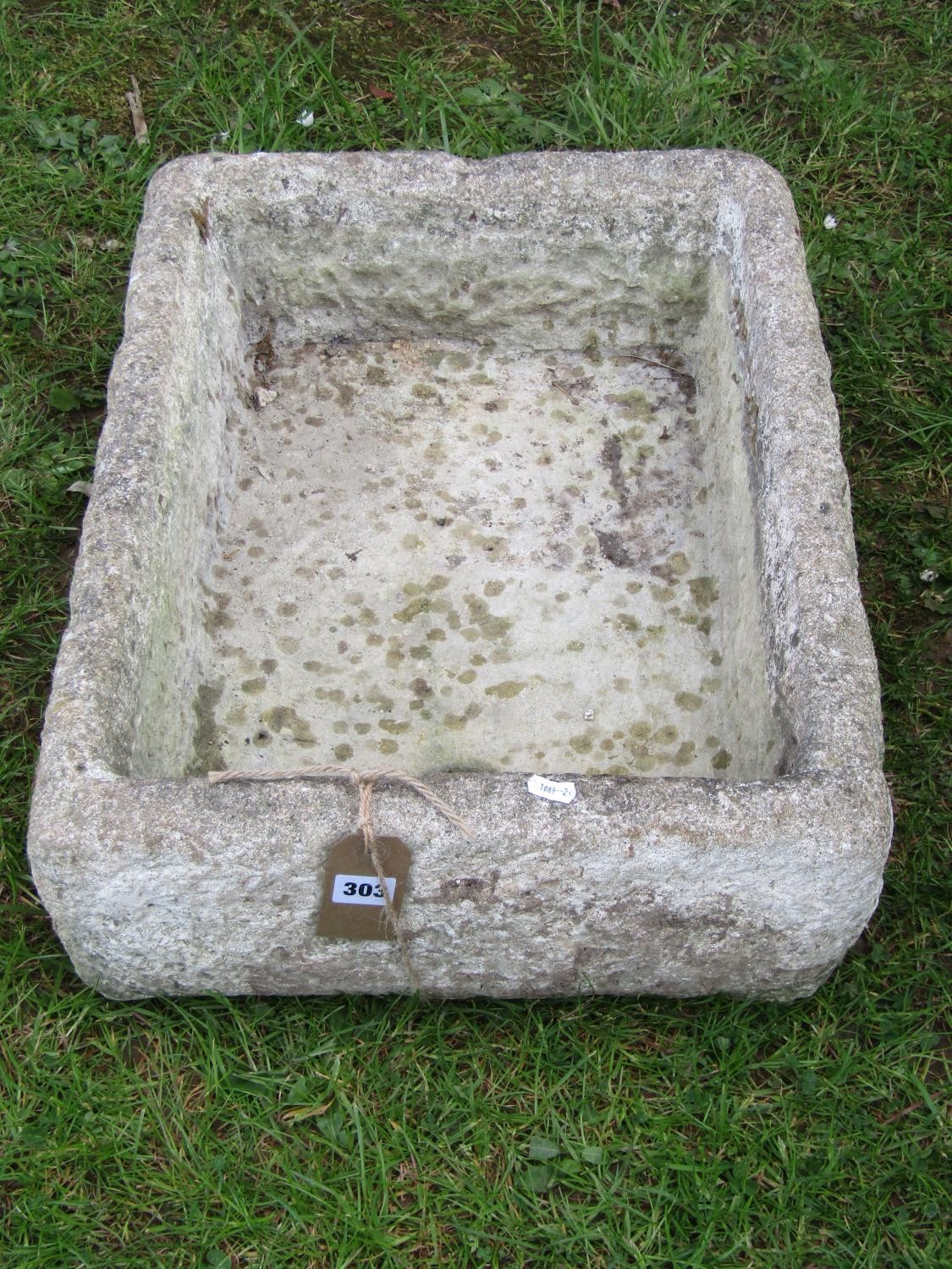 A shallow weathered cast composition stone trough/sink of rectangular form 17 cm high x 60 cm x 45