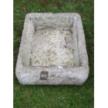 A shallow weathered cast composition stone trough/sink of rectangular form 17 cm high x 60 cm x 45