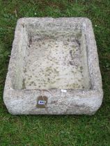 A shallow weathered cast composition stone trough/sink of rectangular form 17 cm high x 60 cm x 45