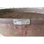 A weathered Kadai fire bowl with drop ring handles and pot riveted seams, (lacks stand) 24 cm high x