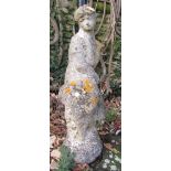 A reconstituted and weathered figure of a young girl in pensive pose, 70 cm high