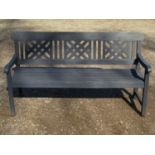 A Rayburn painted teak three seat garden bench with slatted seat and lattice panelled back (af)