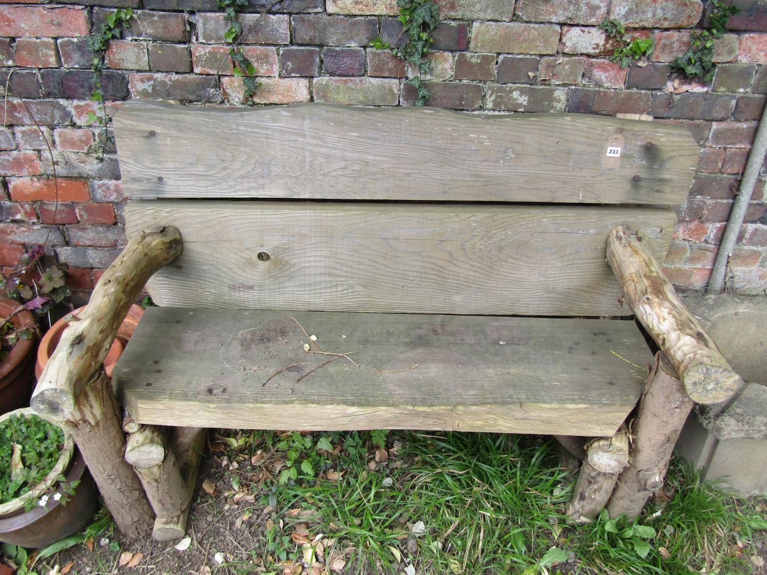 A rustic wooden two seat garden bench 145 cm wide - Image 3 of 3