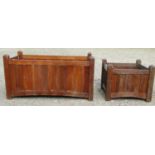 A pair of stained and weathered teak garden planters with facetted square cut supports and slatted