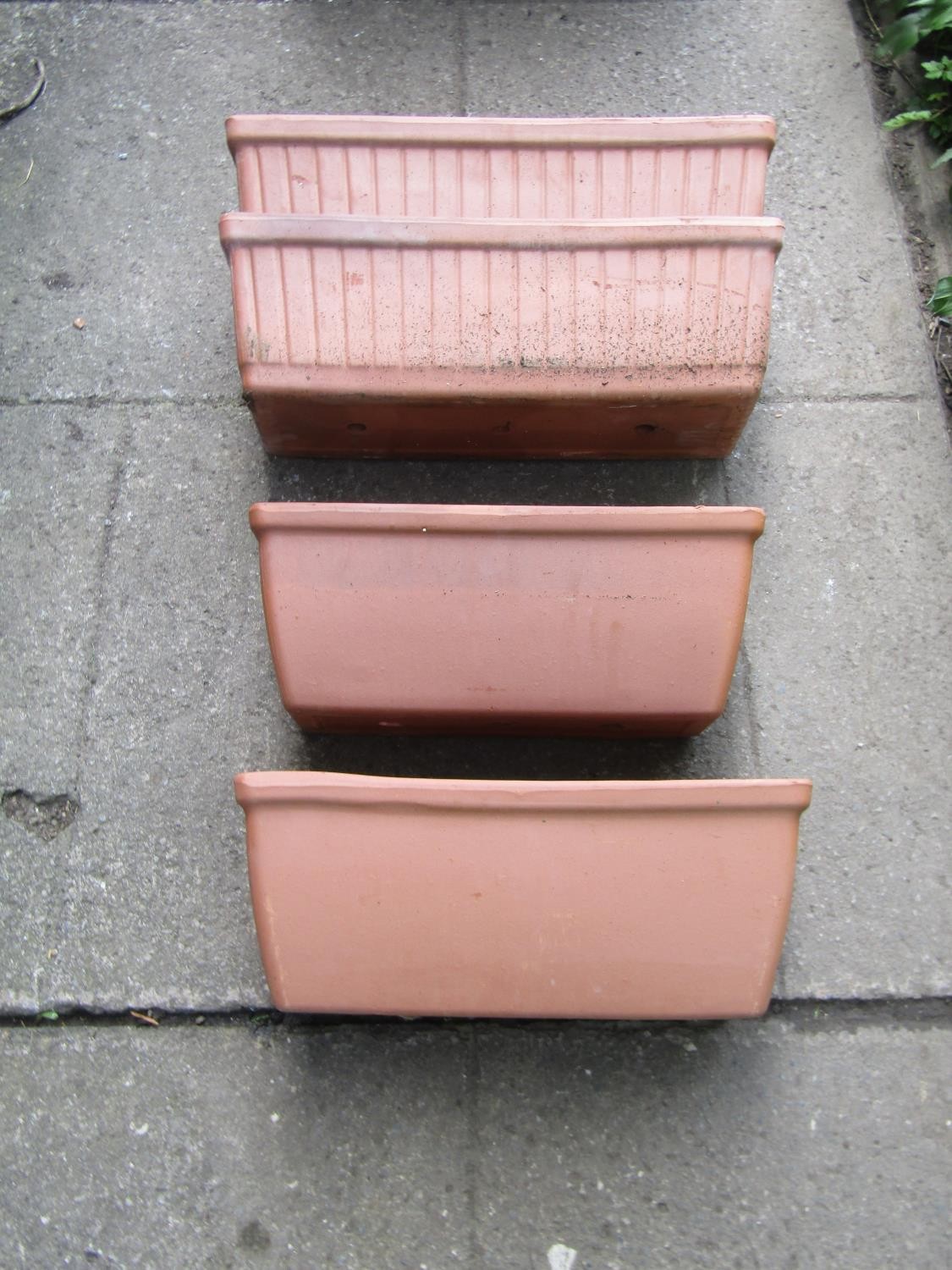 Seven rectangular terracotta flower troughs of varying size and slight variant in design, the larger - Image 2 of 2