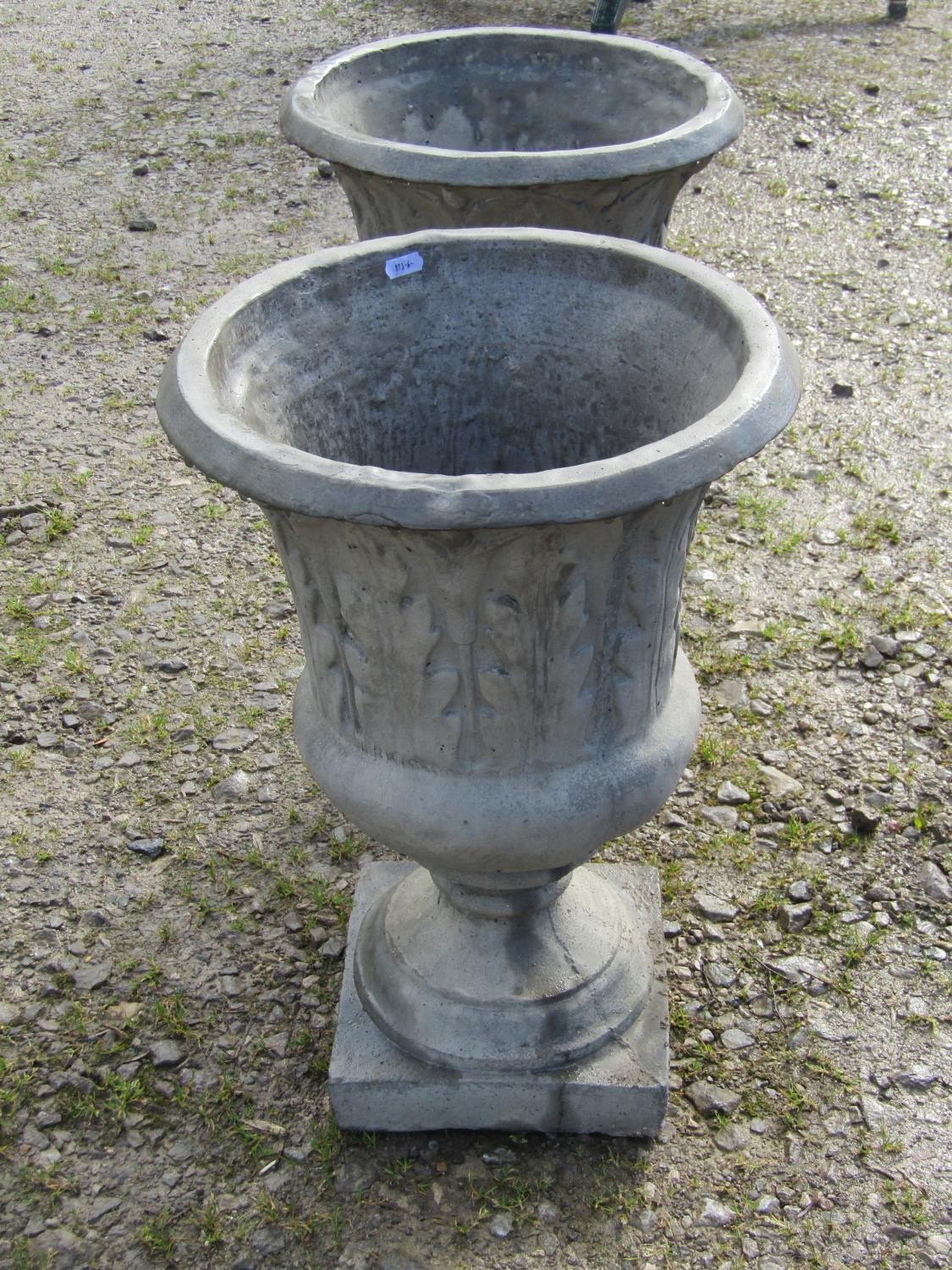 A pair of composition stone trumpet shaped garden urns, with moulded acanthus detail, raised on - Image 2 of 5
