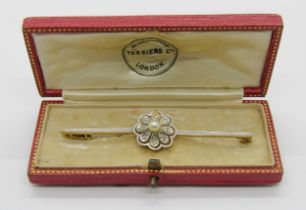 Early 20th century 15ct bi-colour bar brooch set with a pearl and rose-cut diamond cluster, 6.4cm
