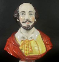 A 19th century Staffordshire Prattware figure of William Shakespeare on a simulated marble style