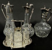 A miscellaneous collection of silver plate and glass ware, including an Art Nouveau water jug, two