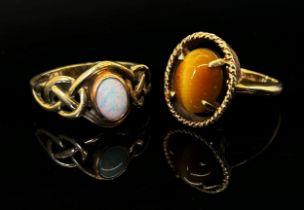Clogau 9ct opal ring, size O, 2.2g and a 10k cabochon tigers eye ring, size L, 3.4g