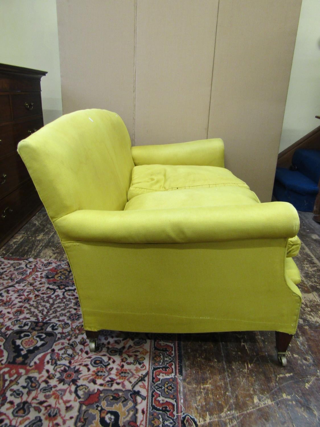 A Howard & Son two seat sofa with scrolled arms raised on square taper legs with brass cup - Image 2 of 4