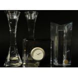 A Jasper Conran Stuart crystal clock together with a pair of tall Villeroy & Boch candlesticks and