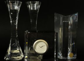 A Jasper Conran Stuart crystal clock together with a pair of tall Villeroy & Boch candlesticks and