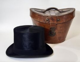 Early 20th century black silk top hat by G.A. Dunn & Co in silk lined stitched leather hat box.