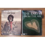 Two substantial coffee-table books, both with spectacular photographic images: The Earth from the