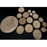 A collection of 19th century plaster relief roundels showing a portrait of Admiral Lord Nelson,