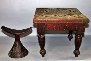 An Ethiopian wooden headrest with incised geometric patterns (cracked and glued), and a wooden small