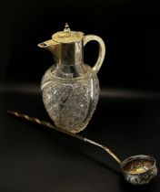 A late 19th century cut glass wine jug with silver collar, spout and handle, Sheffield 1896, maker