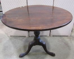 A Georgian snaptop table, 90cm diameter