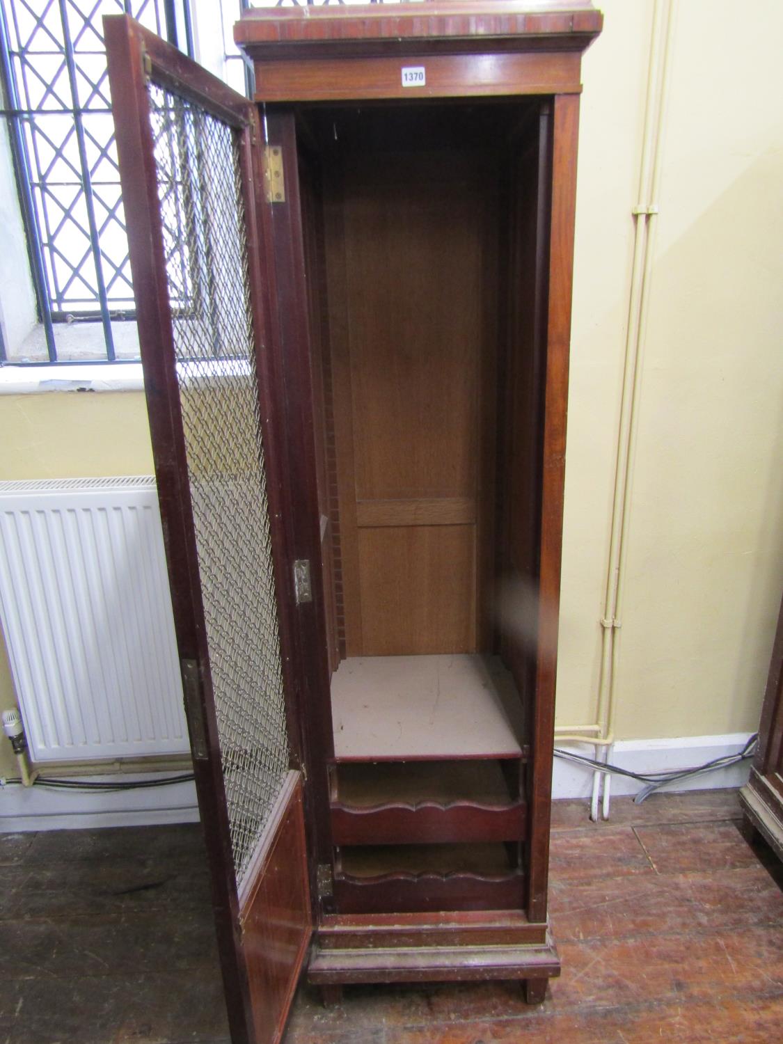 19th century cupboard of square cut tapering form enclosed by a brass grilled door, 50cm wide - Image 2 of 3