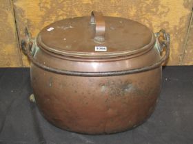 A 19th century copper boiling pot and cover with iron handle, 50cm wide